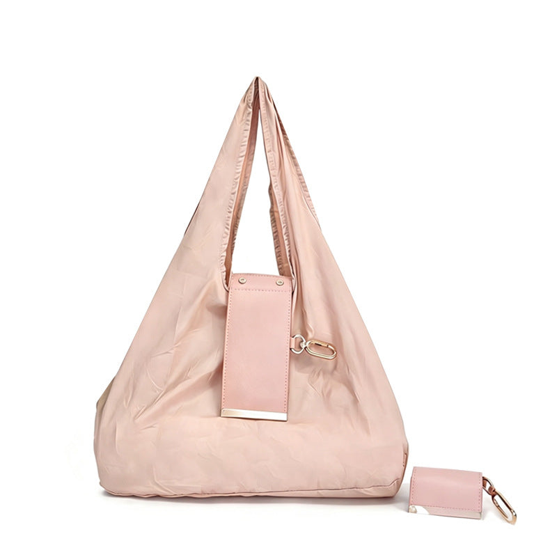 The Keychain That Turns Into a Bag